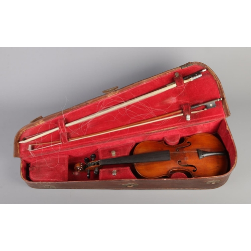 78 - An early 20th century two piece back violin. Labelled The School Violin, Rushworth & Dreaper. 13.5in... 