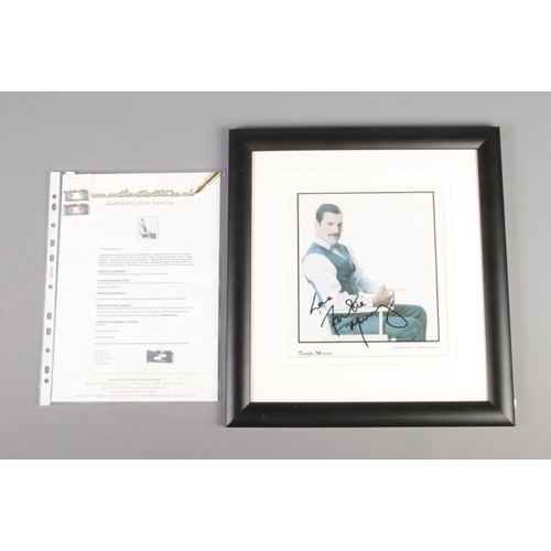 84 - A framed Freddie Mercury photograph with certificate of authenticity.