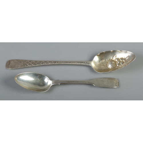 88 - A George III silver berry spoon along with a Victorian silver spoon. The berry spoon assayed London ... 