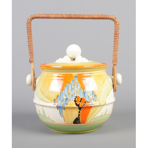 1 - A Clarice Cliff Bizarre Fantasque biscuit barrel decorated in the Windbells design. Shape No. 335.