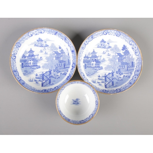 12 - A Forester and Hulme transfer printed tray along with a blue and white tea bowl and two saucers, pos... 