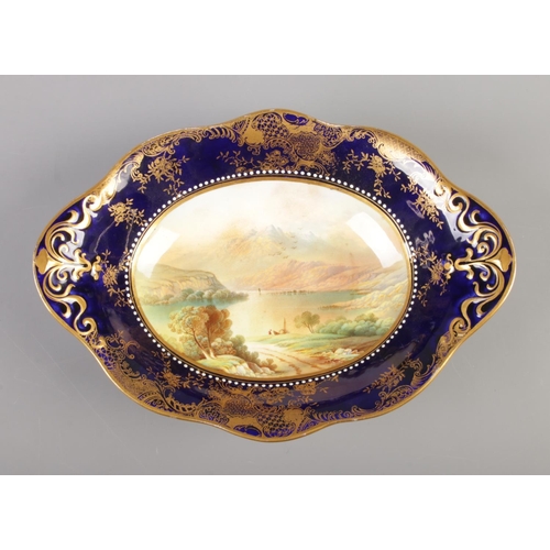 16 - An Aynsley porcelain centre piece. With hand painted landscape scene, Upper Lake Killarney, and coba... 