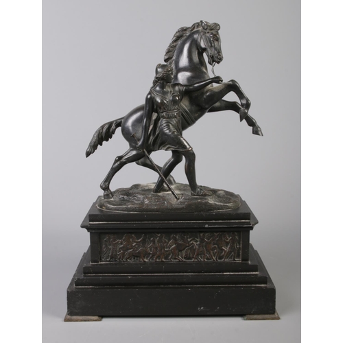 38 - Graux Marly Foundry, a pair of bronze Marly Horses raised on slate plinths. Signed. 32cm.