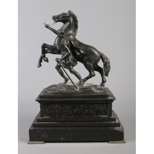 38 - Graux Marly Foundry, a pair of bronze Marly Horses raised on slate plinths. Signed. 32cm.