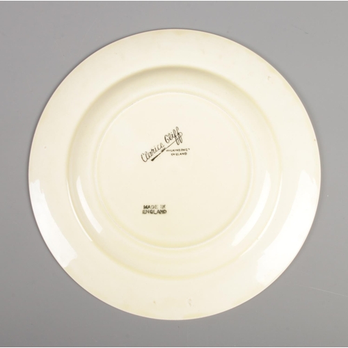 7 - A Wilkinson Ltd Clarice Cliff side plated decorated in the Honeydew design. Diameter 20cm.