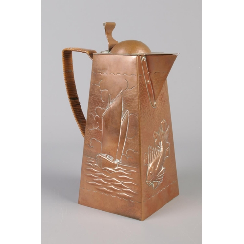 30 - A Newlyn School copper hot water pot designed by Herbert Dyer (1898–1974). Decorated with a sea bird... 