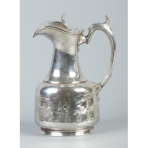 32 - A silver plated hot water pot decorated with military figures. 25cm.