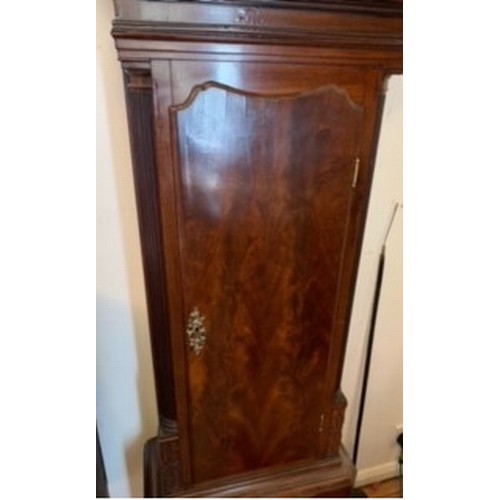 197 - A Georgian mahogany eight day longcase clock by Thomas Ogden, Halifax. With twin swan neck pediment.... 