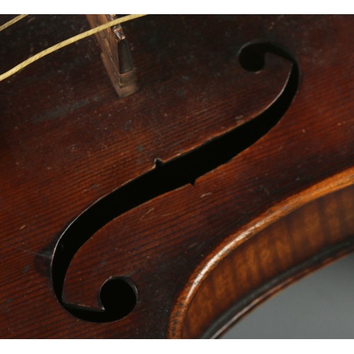 79 - A  19th century two piece back violin, labelled for Joseph Guarnerius dated 1886. In wooden case wit... 