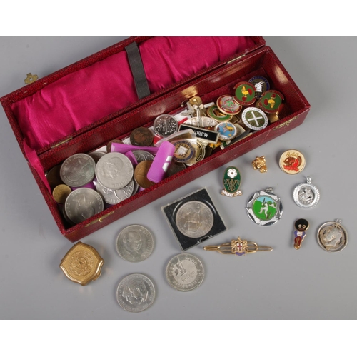 240 - A box of mostly coins and badges. Including commemorative crowns, sporting badges, Stratton pill box... 