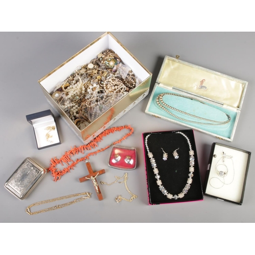 248 - A box of costume jewellery. Including coral necklace, pearl necklaces with silver clasps, earrings, ... 