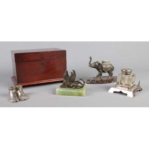 236 - A quantity of collectables, to include two section tea caddy, elephant desk lighter on marble base, ... 