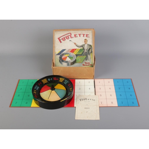 135 - A boxed Poolette 'Your Roulette' game with wheel, bearings, gameboard and rules book. Chips missing.