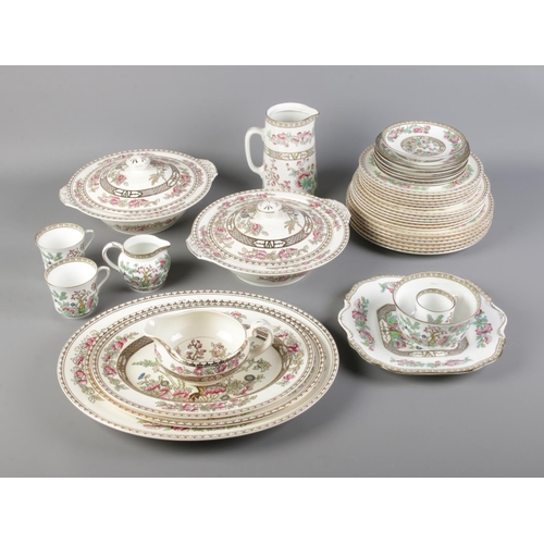 258 - A box of 'Indian Tree' pattern ceramic dinner services. Includes Alfred Meakin and Bridgwood example... 