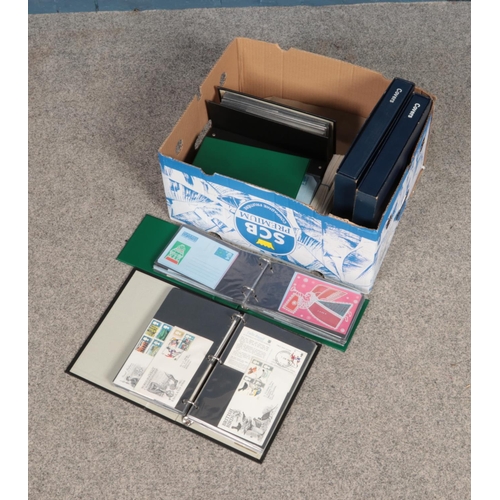 263 - A box of first day covers mostly displayed in 8 folders and includes British and Channel Island exam... 