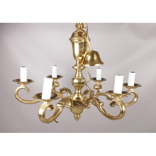 333 - A heavy brass six branch chandelier. Height 53cm, Width 66cm. Approximately 10kg.