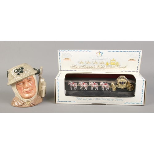 10 - A Royal Doulton character jug 'The Soldier' D6876, together with a boxed Matchbox Her Majesty's Gold... 