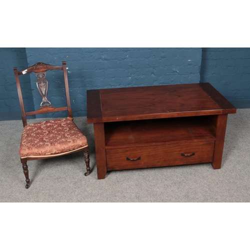 568 - An oak TV stand with single drawer and child's upholstered bedroom chair on castors. TV stand dimens... 