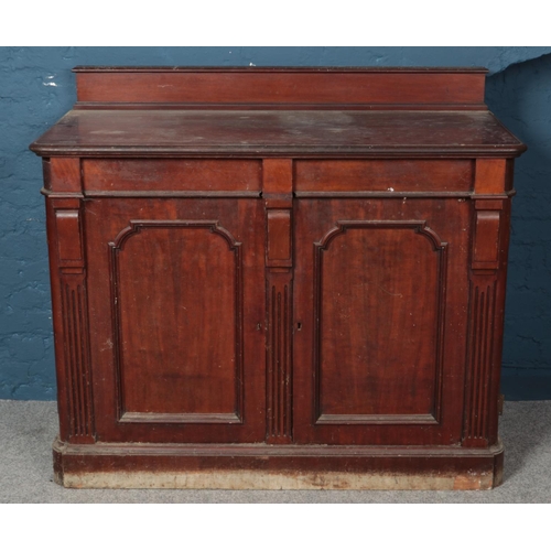 571 - A carved mahogany sideboard. (112cm x 130cm x 60cm)