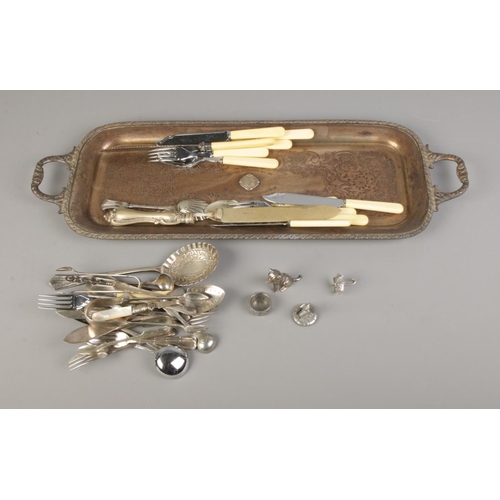 101 - A quantity of silver plate including engraved commemorative tray, assorted cutlery and miniature fig... 