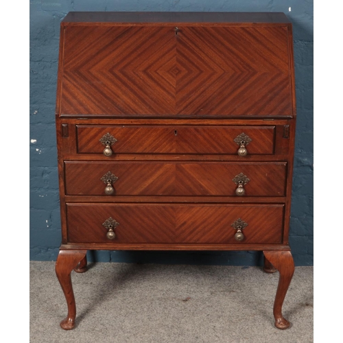 583 - A mahogany bureau. With fitted interior. (104cm x 76cm)