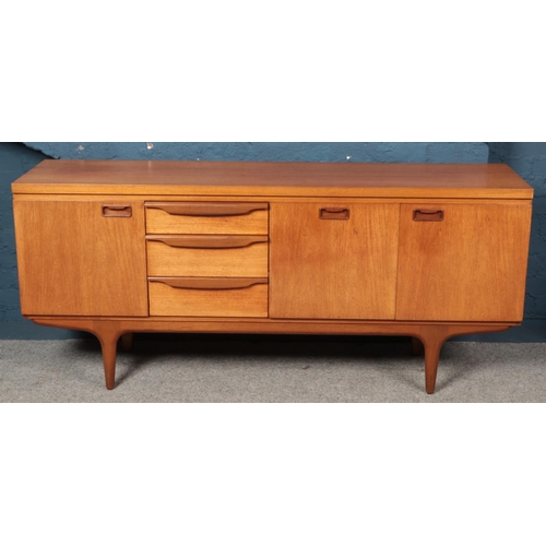 584 - A Greaves Thomas teak sideboard. (77cm x 176cm)