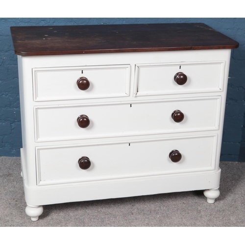 593 - A Victorian painted pine chest of two over two drawers. (87cm x 104cm)