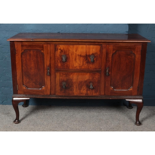 596 - A mahogany sideboard. (90cm x 138cm)