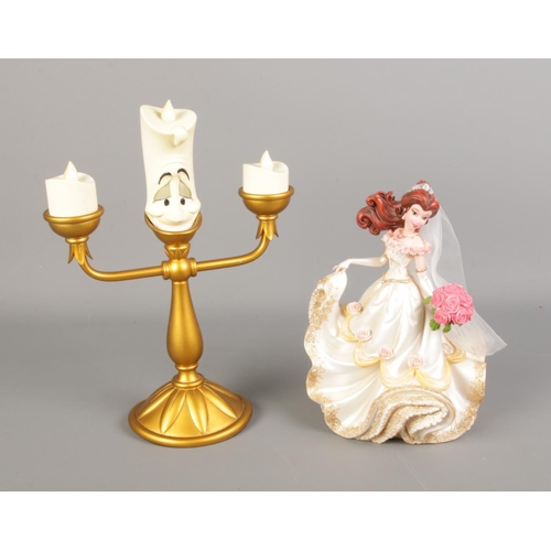 109 - A pair of Disney's Beauty & The Beast figures including Wedding Day Belle and Large Lumiere.