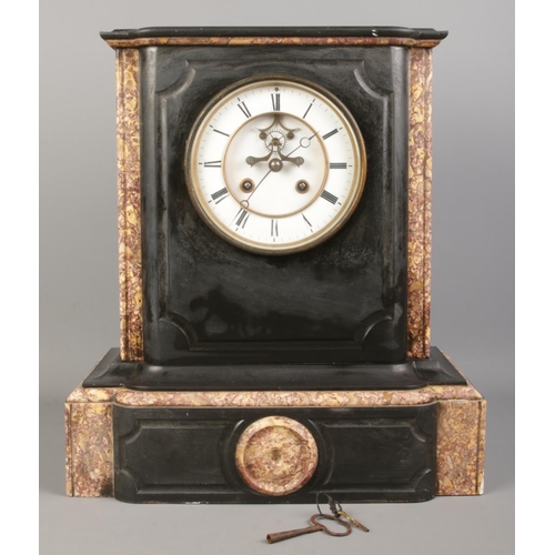 121 - A black slate and marble mantel clock, with O. Berger movement on white enamel dial and Roman Numera... 