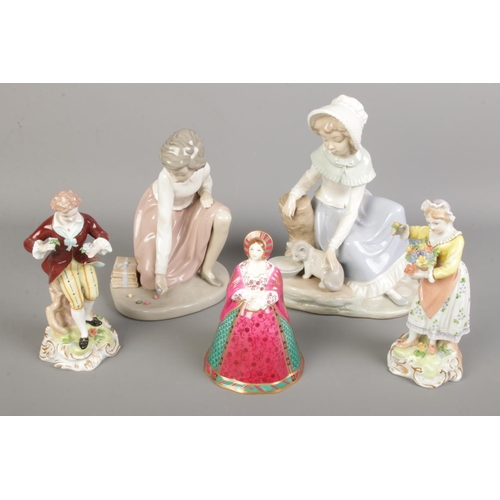 153 - Five ceramic figures. Including two Nao by Lladro, pair of Dresden figures and a Royal Worcester Cat... 