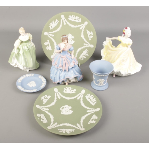 172 - A collection of ceramics. Includes Wedgwood and Doulton figures of ladies and Wedgwood Jasperware.