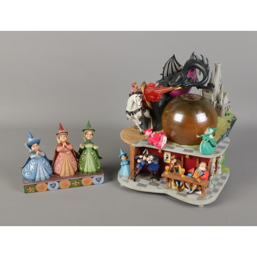 186 - A quantity of Disney's Sleeping Beauty figures including trio of traditions witches and large snow g... 