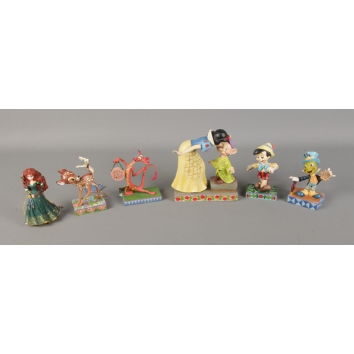 193 - A quantity of assorted Disney figures including several Traditions examples. Characters including Sn... 