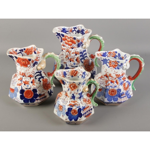 194 - Four graduating Masons Hydra jugs decorated in the Japan Basket pattern. Tallest 21.5cm.