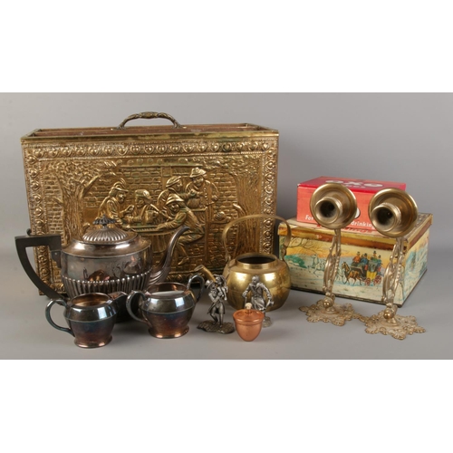 200 - A good collection of metalwares, to include brass bound two section canterbury, pewter figures, bras... 