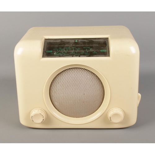 202 - A Bush 1950's bakelite radio in cream. Plug is missing.