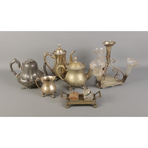 208 - A quantity of assorted metal wares including pewter tea pot, silverplated coffee pot and candlestick... 