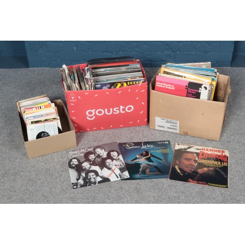 211 - Three boxes of assorted records and singles to include Kylie Minogue, Jim Reeves, Glen Campbell, The... 