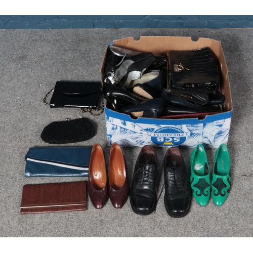 215 - A box of vintage shoes and handbags including men's and women's examples.