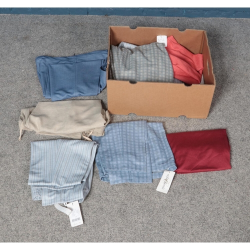 216 - A box of vintage trousers most new with original tags.