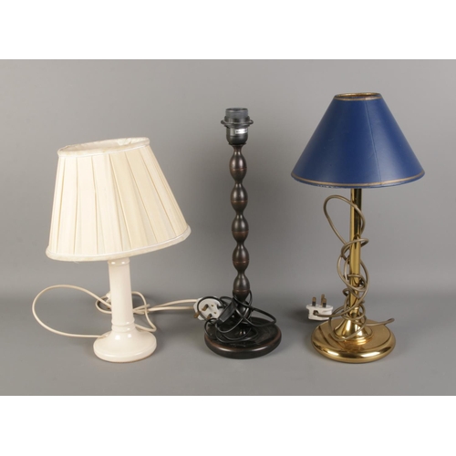 221 - A box of three table lamps. Two including matching shades.