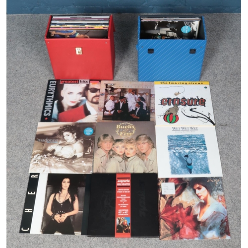 223 - Two carry cases containing an assortment of single and album vinyl records. To include Wet Wet Wet, ... 