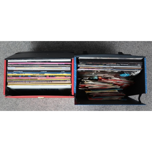 223 - Two carry cases containing an assortment of single and album vinyl records. To include Wet Wet Wet, ... 