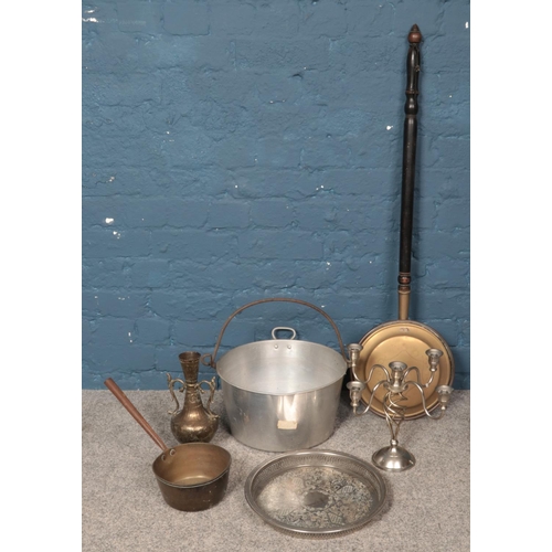 226 - A collection of metalwares, to include silver plated serving tray, four branch candelabra, and large... 