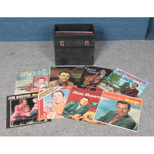 227 - A record carry case containing a collection of Jim Reeves vinyl records. To include God Be With You,... 