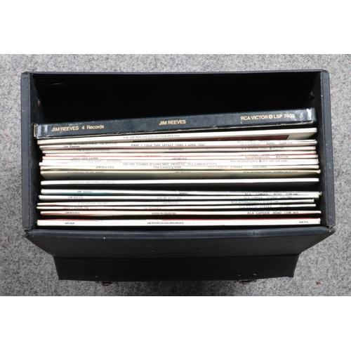 227 - A record carry case containing a collection of Jim Reeves vinyl records. To include God Be With You,... 