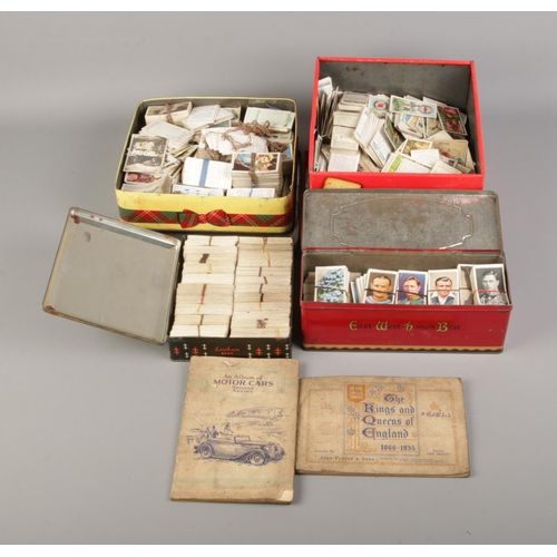 242 - A large quantity of assorted cigarette cards including two collectors albums. Mostly John Players & ... 