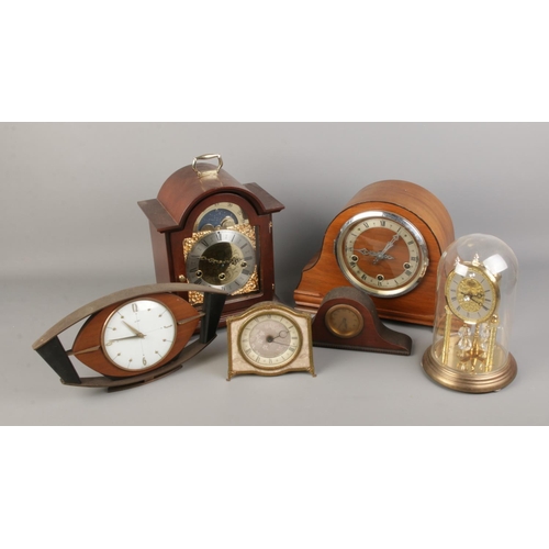 244 - A quantity of assorted clocks including Enfield mantel and torsion example.