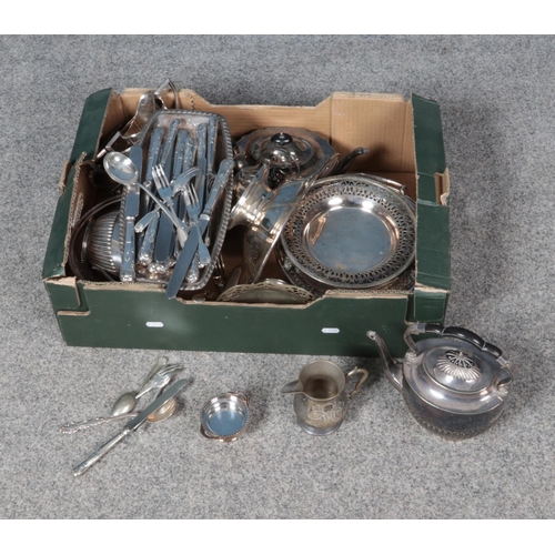 253 - A large quantity of silver plate including cutlery, jugs and trays.